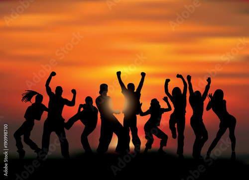 Group happy active people silhouettes and sunset.