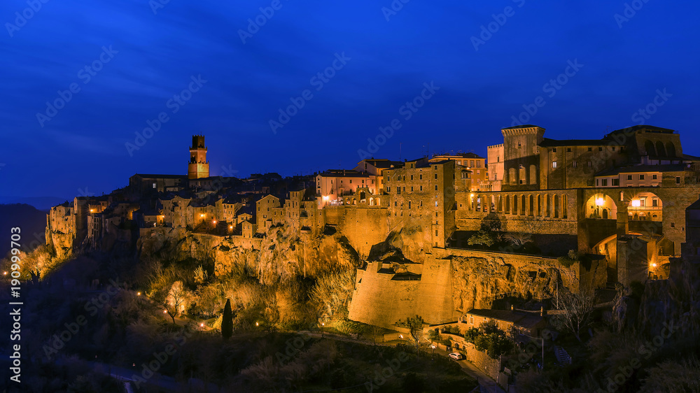 Aerial view of Pitigliano in the blue hour, Grosseto, Tuscany, Italy