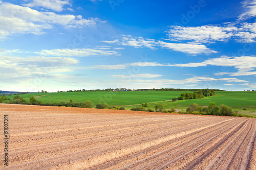 Fotografija spring of landscape with ploughed field