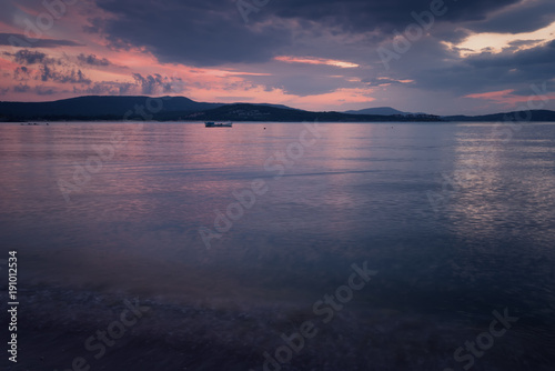 Magnificent cloudy sunset over the sea. Summer sunset  landscape  seascape.