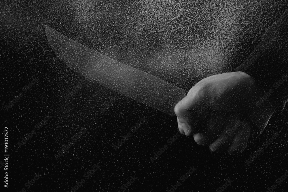 Φωτογραφία black and white photo with glitches of man holding knife