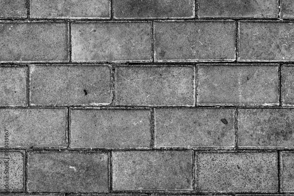 Fototapeta premium Pavement. Sidewalk tile background. Pavement tile. Top view. Closeup