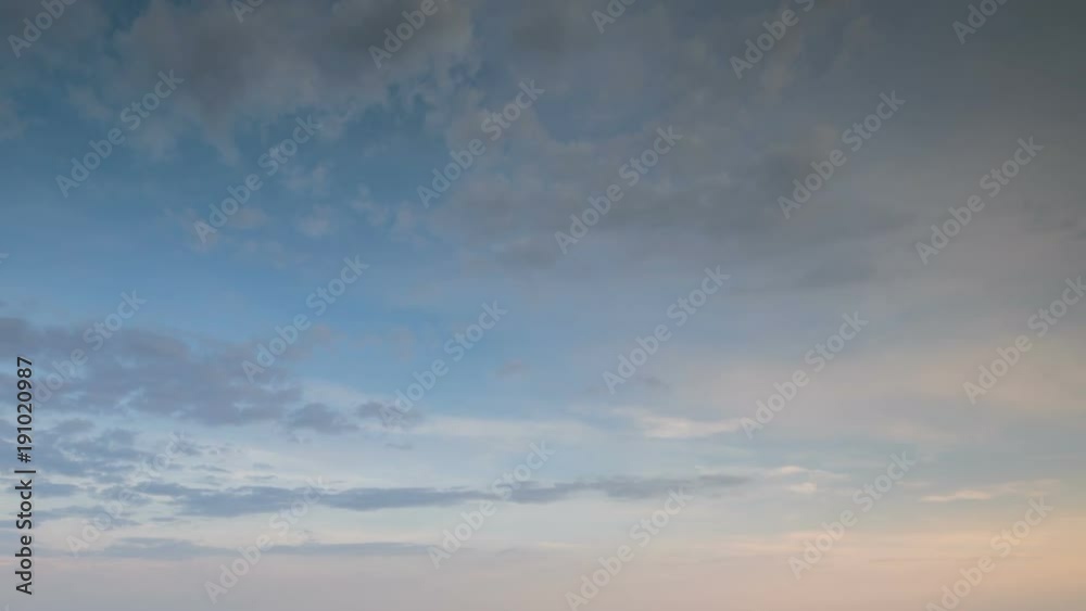 Russia, time lapse. Formation and rapid movement of white clouds of different shapes in the blue sky in late spring at sunset. Russia, time lapse. Formation and rapid movement of white clouds of different shapes in the blue sky in late spring at sunset.