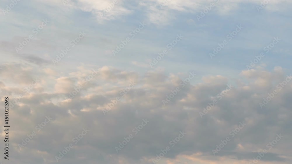 Russia, time lapse. Formation and rapid movement of white clouds of different shapes in the blue sky in late spring at sunset. Russia, time lapse. Formation and rapid movement of white clouds of different shapes in the blue sky in late spring at sunset.