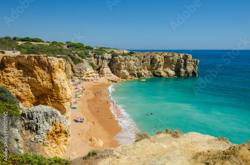 View of limestone cliffs of the Rabbit Beach (Praia da Coelha) in Albufeira, District Faro, Algarve, Southern Portugal