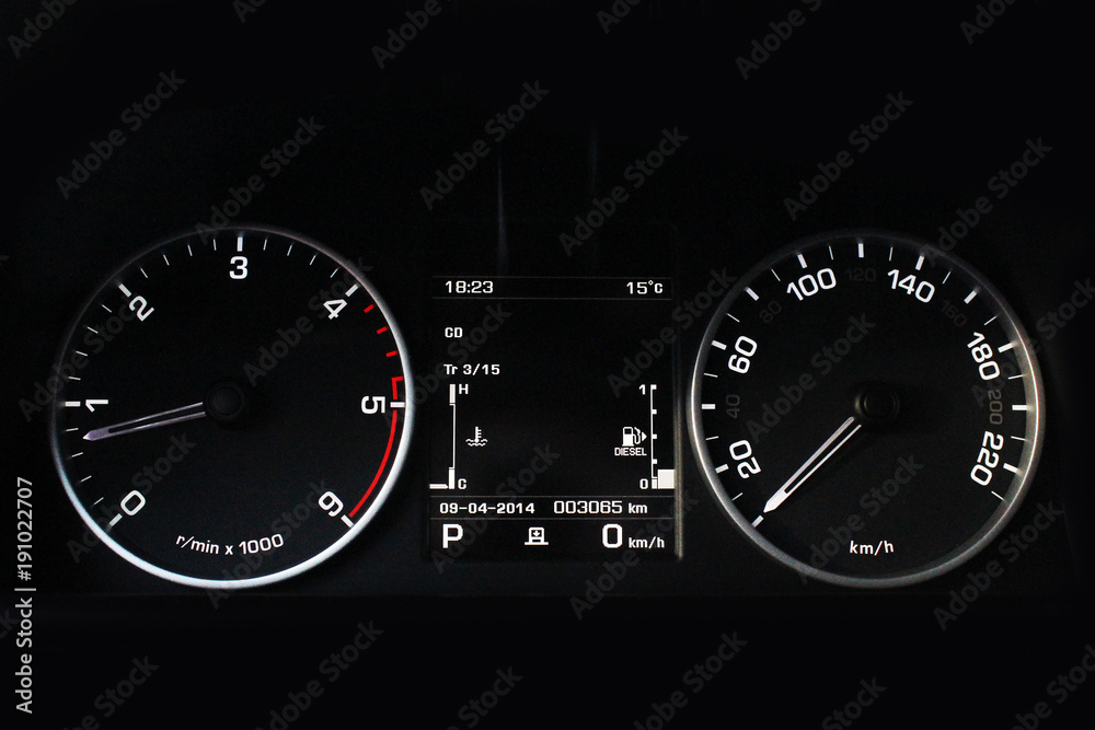 Car dashboard, illuminated panel, speed display. Car. Black