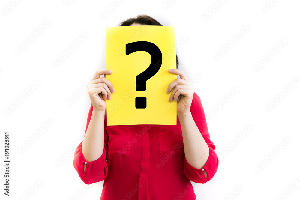 beautiful, young woman showing a question mark on a yellow piece of paper in front of her head, on a white background. Anonymous business. Pretty slim girl studio photo isolated beautiful, young woman showing a question mark on a yellow piece of paper in front of her head, on a white background. Anonymous business. Pretty slim girl studio photo isolated