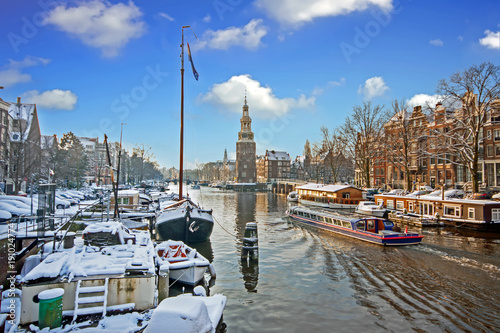 Photography Snowy Amsterdam with the Montelbaan tower in winter in the Netherlands