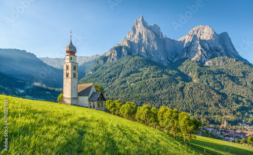 Alpine scenery with church in the Dolomites, Seis am Schlern, South Tyrol, Italy photo