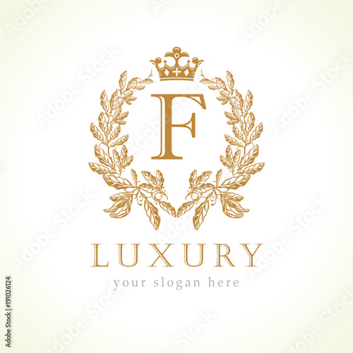 Luxury F letter and crown monogram logo. Laurel elegant beautiful round identity with crown and wreath. Vector letter emblem F for Antique, Restaurant, Cafe, Boutique, Hotel, Heraldic, Jewelry