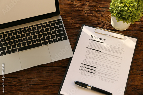 resume paper on desk.Business Concept