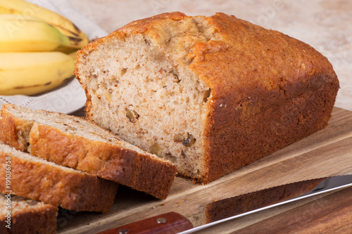 Closeup of a loaf of sliced banana nut bread