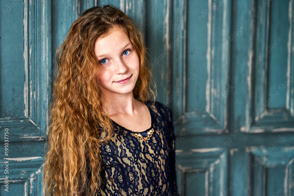 Fototapeta premium Portrait of red-haired girl