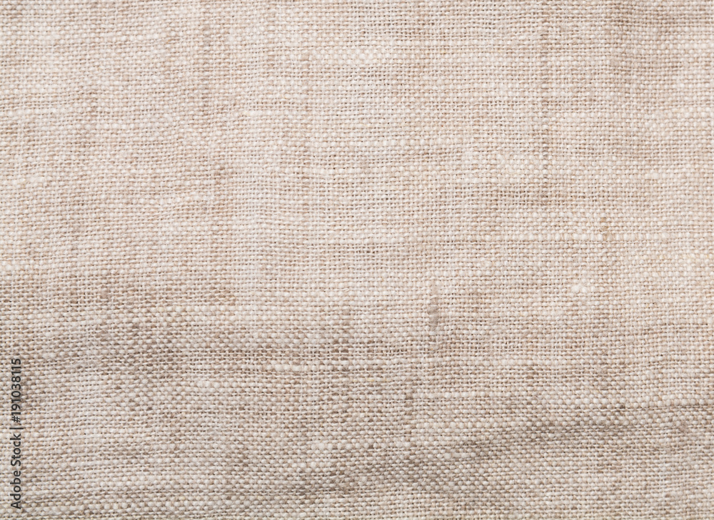 Fototapeta premium Beige linen background.