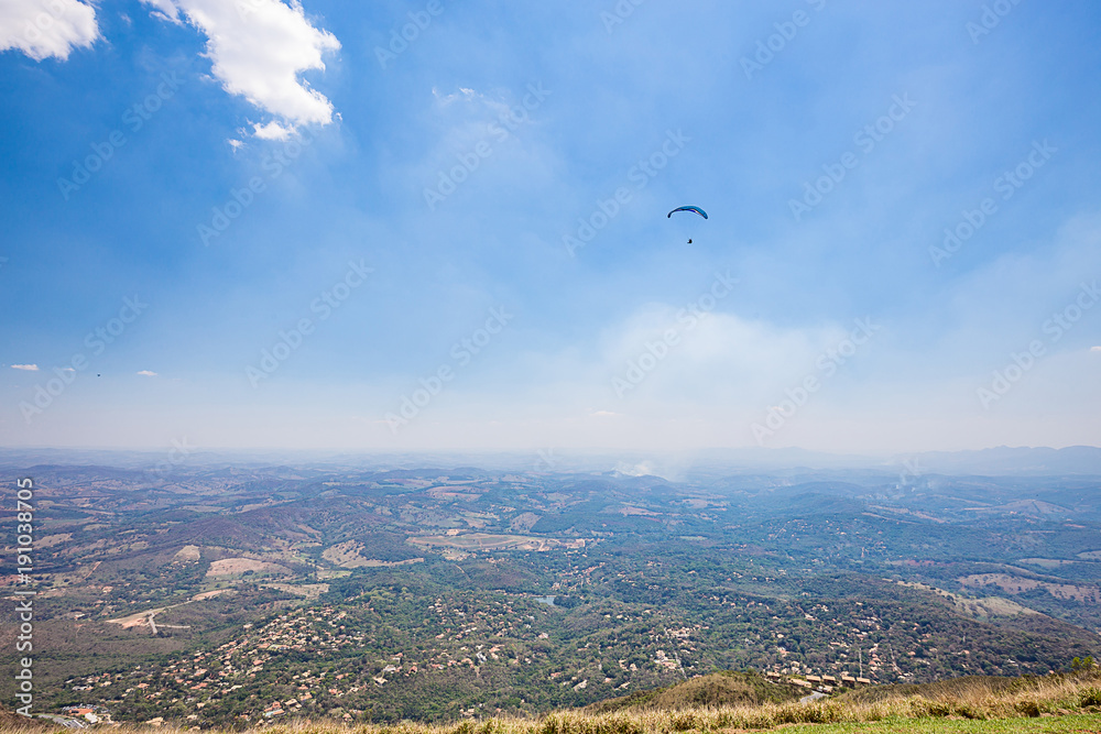 Belo Horizonte, Minas Gerais, Brazil. Paraglider flying from top of the world mountain Belo Horizonte, Minas Gerais, Brazil. Paraglider flying from top of the world mountain