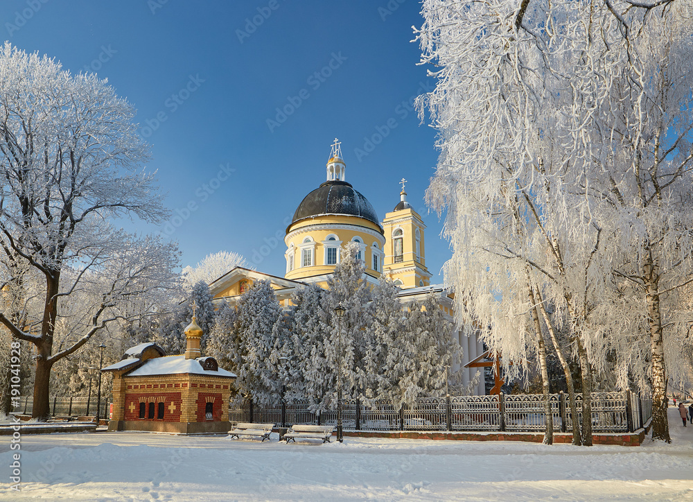 GOMEL, BELARUS - JANUARY 23, 2018: Peter and Paul Cathedral in the city park in icy frost. GOMEL, BELARUS - JANUARY 23, 2018: Peter and Paul Cathedral in the city park in icy frost.