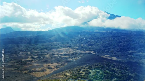 Time lapse of dramatic clouds over mountains.