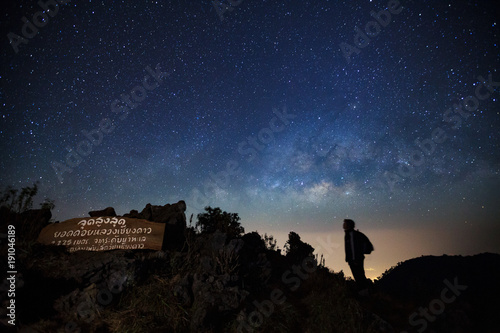 Milky Way Galaxy with Thai label Highest point at Doi Luang Chiang Dao before sunrise. Long exposure photograph.With grain photo