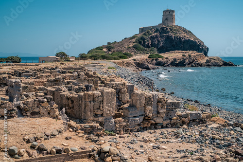 The watchtower on the Nora penisula. Famous archaeologic site near Cagliari, Sardinia, Italy. photo