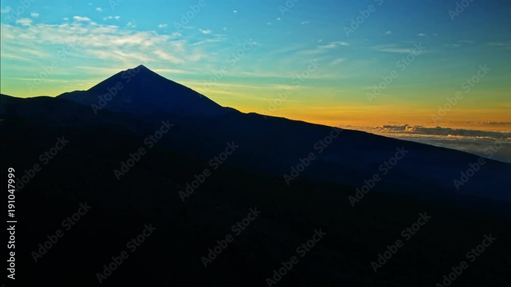Time lapse of sunset behind vulcano Teide sourrounded by clouds. Time lapse of sunset behind vulcano Teide sourrounded by clouds.