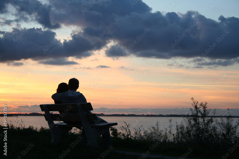 Loving couple at the sundown