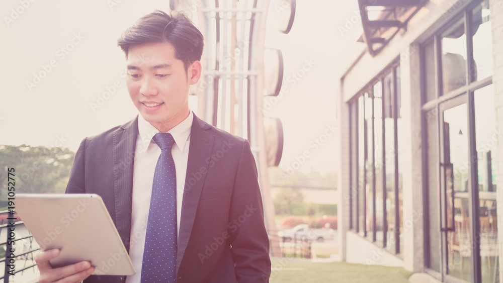 young asian business man have a happy time with his job, love working