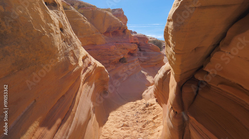 Dry Gorge With Smooth And Wavy Rocks Of The Red Canyon
