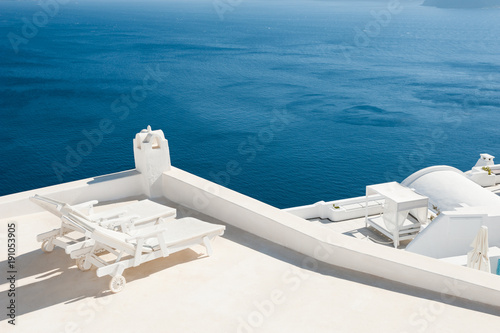 Two sunbeds on the terrace with sea views.