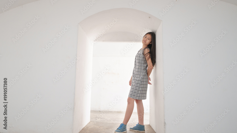 Portrait of a cute little girl looking at camera
Portrait of a cute little girl looking at camera