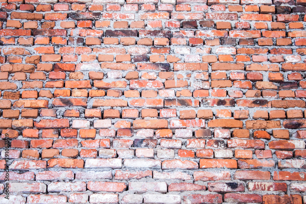 Naklejka premium Red brick wall background textured