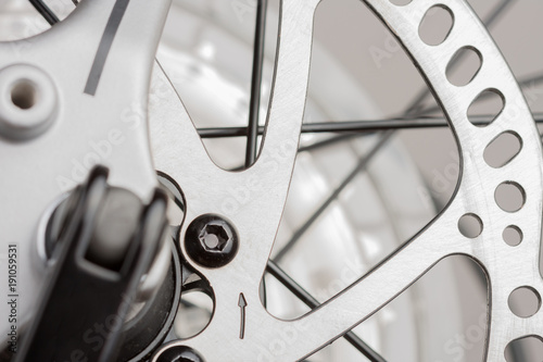 Hydraulic rear disc brake of mountain bike, close up view, studio photo