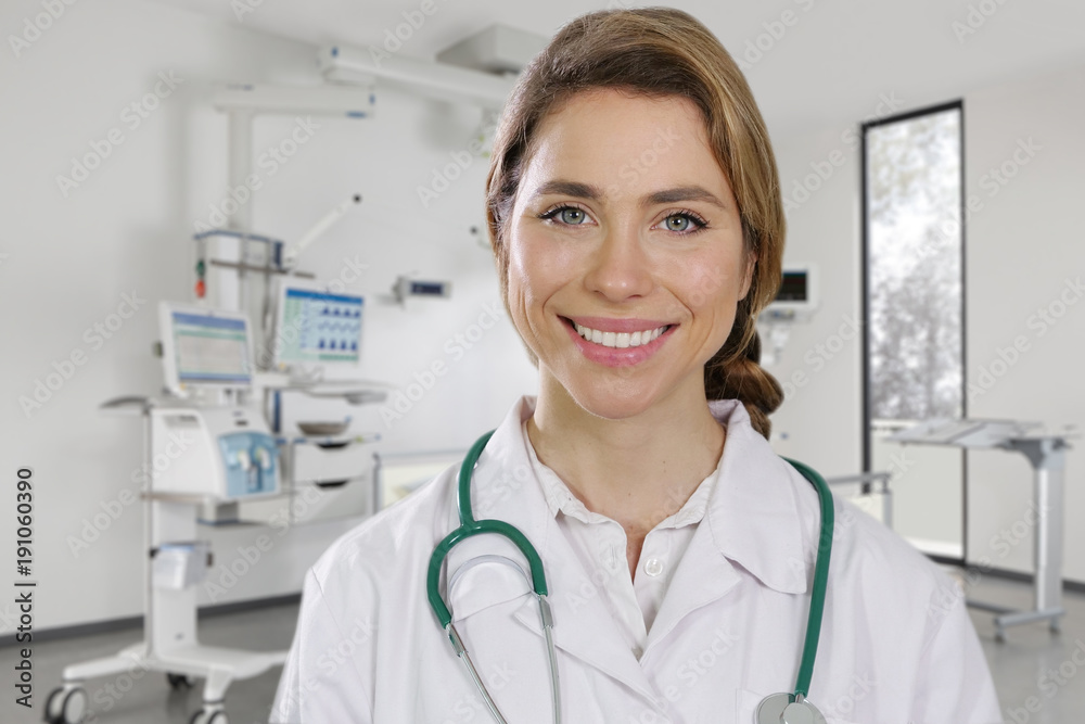 Portrait of a beautiful female doctor smiling showing a perfect smile, on professional clinic. Concept of: portrait, doctor, medical, successfull Portrait of a beautiful female doctor smiling showing a perfect smile, on professional clinic. Concept of: portrait, doctor, medical, successfull