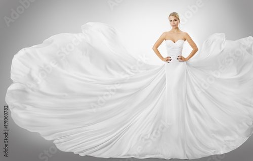 Obraz na płótnie Woman White Flying Dress, Elegant Fashion Model Posing in Wedding Fluttering Gow