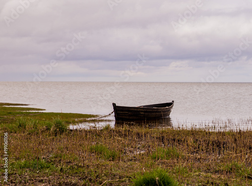 lonely boat by the sea