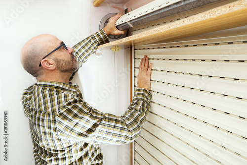 Canvas Print roller shutter and handyman for repair and restore
