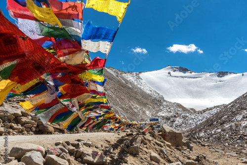 Prayer flags at Khardungla Pass, the highest motorable pass in the world, ladakh, Jammu and Kashmir, India photo