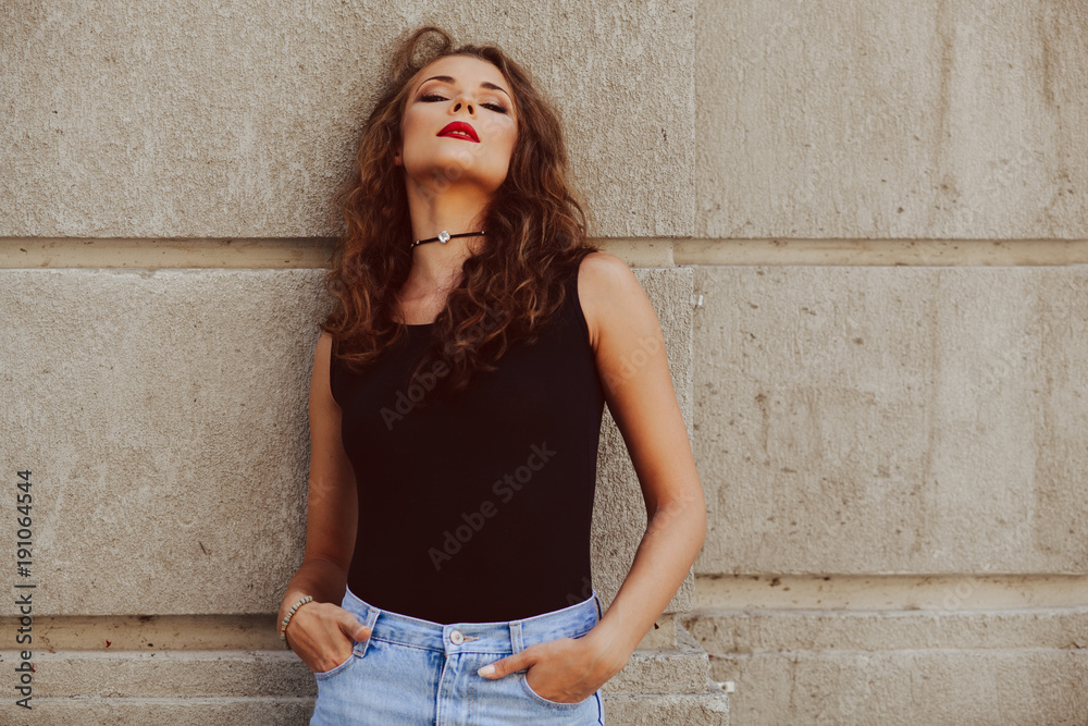 Potrait of beautiful young woman with beautiful curly hair Potrait of beautiful young woman with beautiful curly hair