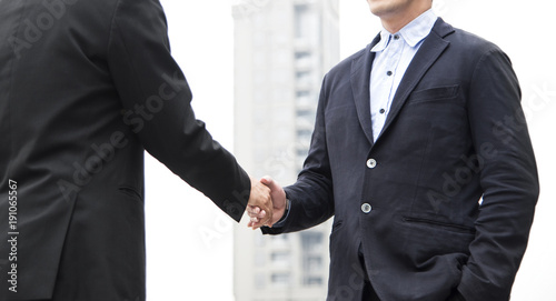 Businessman making handshake agreement. concept cooperation. panoramic banner with copy space.