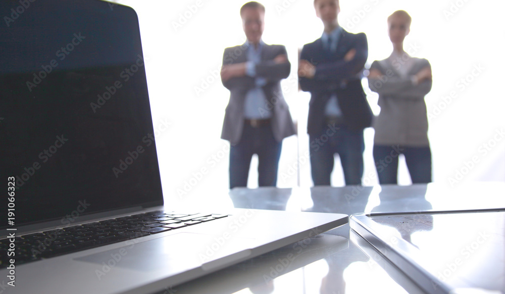 Close up of desktop computer on the background of business team Close up of desktop computer on the background of business team
