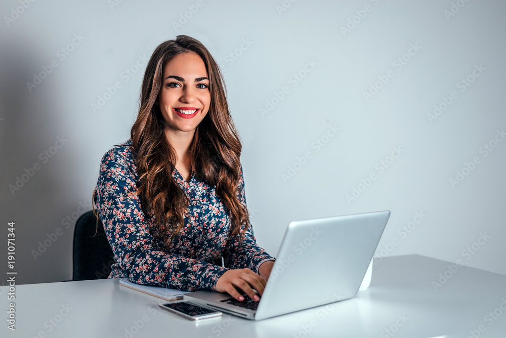 Portrait of attractive businesswoman in modern office. Portrait of attractive businesswoman in modern office.