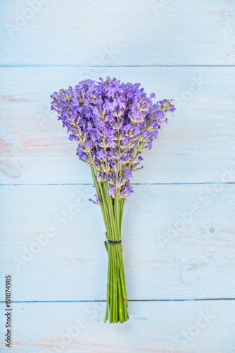 Fototapeta Naklejka Na Ścianę i Meble -  Bouquet of lavenders flower on light blue wooden background .