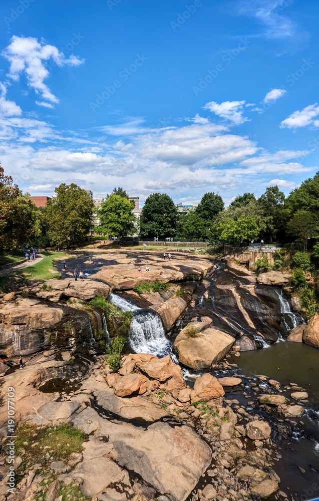 Falls Park, Greenville, SC. A public park for recreation with a river flowing through it.