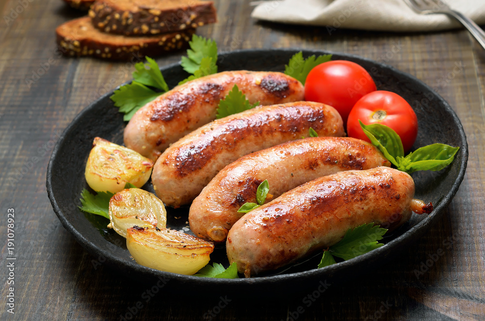 Barbecue sausages in frying pan Barbecue sausages in frying pan