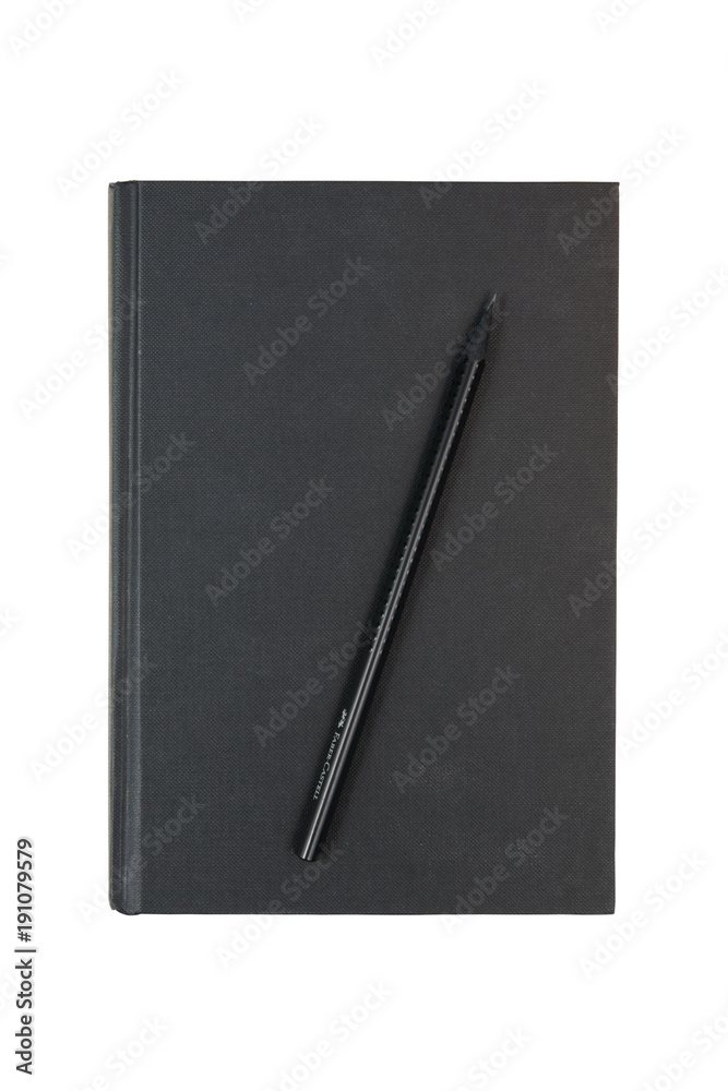 Closed Big black hardcover book with black pencil isolated on white background, surface. Path saved Closed Big black hardcover book with black pencil isolated on white background, surface. Path saved