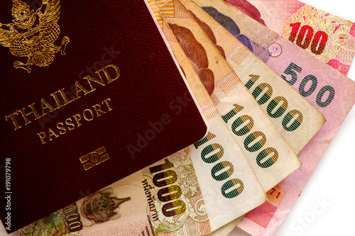 Thai passport with banknote...