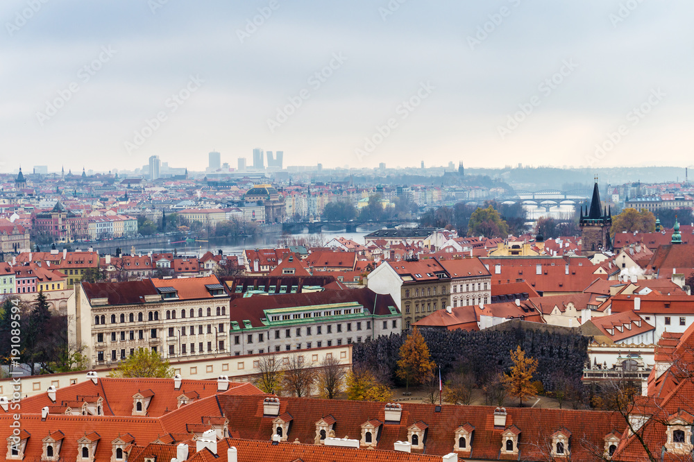 Cityscape of Prague city from hill, beautiful view of red roofs, Czech Republic