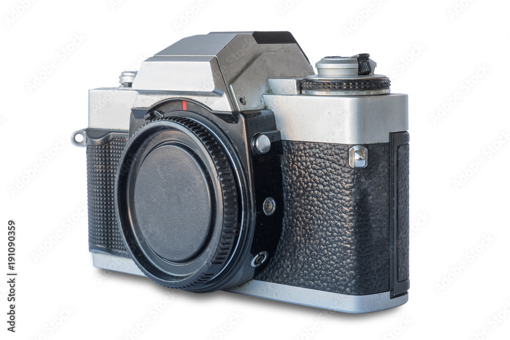 Old vintage black and silver camera on white background, isolated