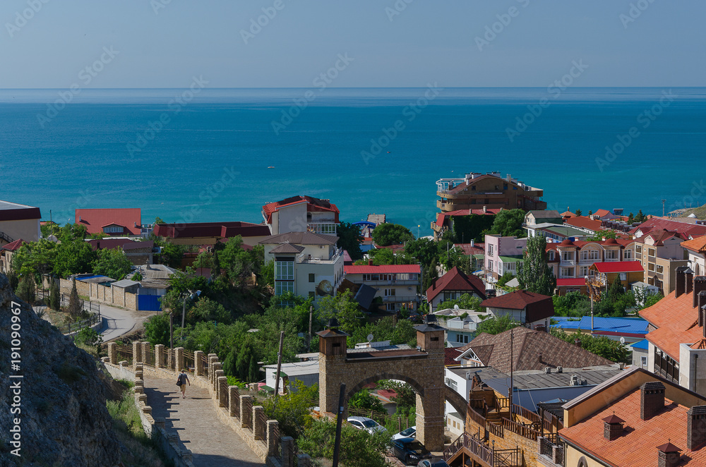 Top view on the resort city of Sudak on a Sunny day. Crimea, the concept of summer vacation
