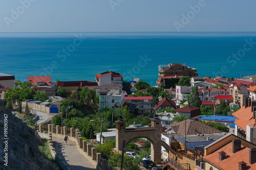 Top view on the resort city of Sudak on a Sunny day. Crimea  the concept of summer vacation