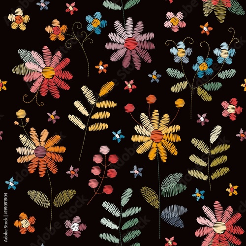 Wallpaper Mural Embroidery seamless pattern with beautiful colorful flowers and leaves on black background. Fashion design. Vector embroidered illustration. Torontodigital.ca